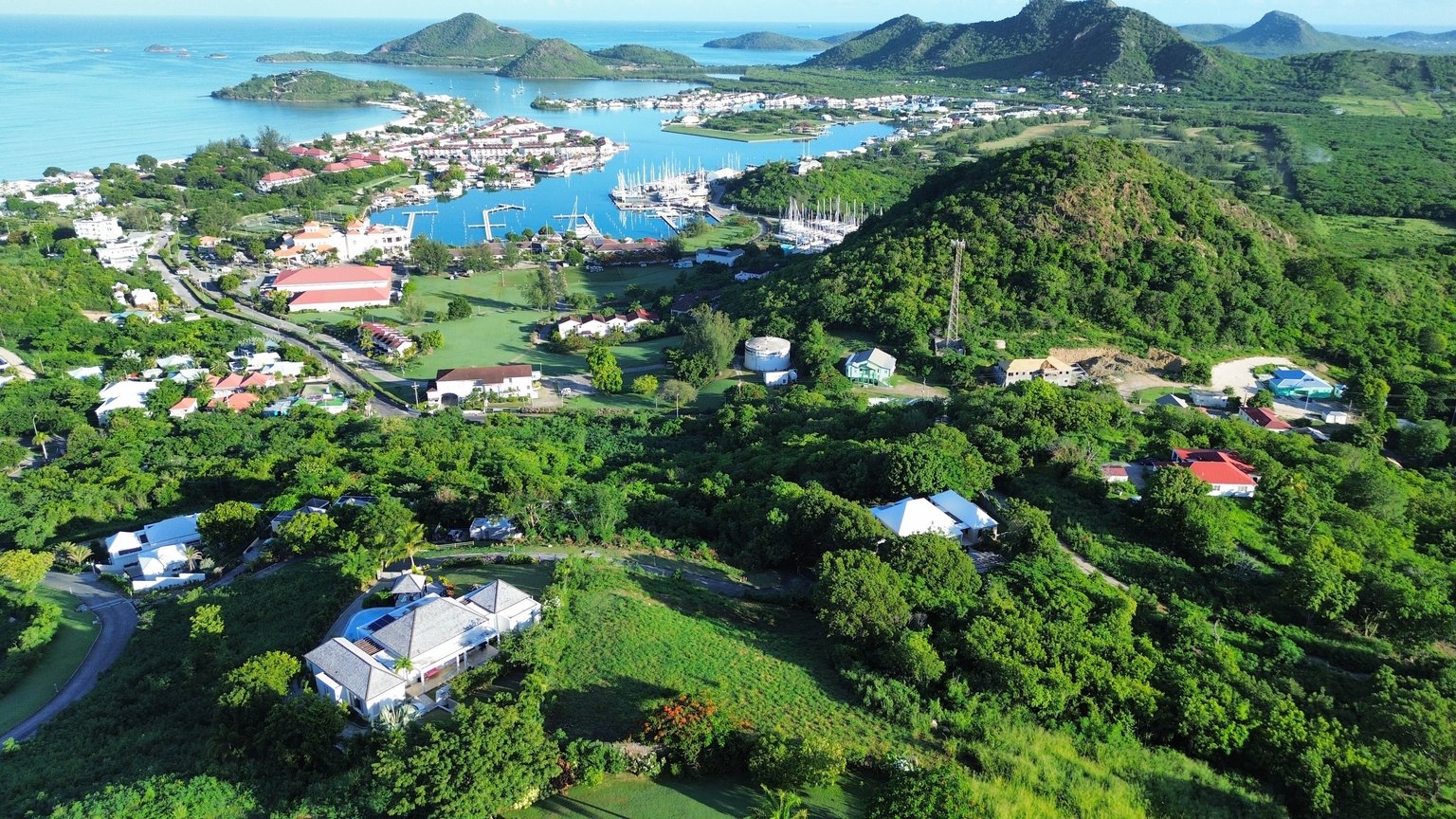 Aerial view of Jolly Harbour marina and the surrounding western coast of Antigua