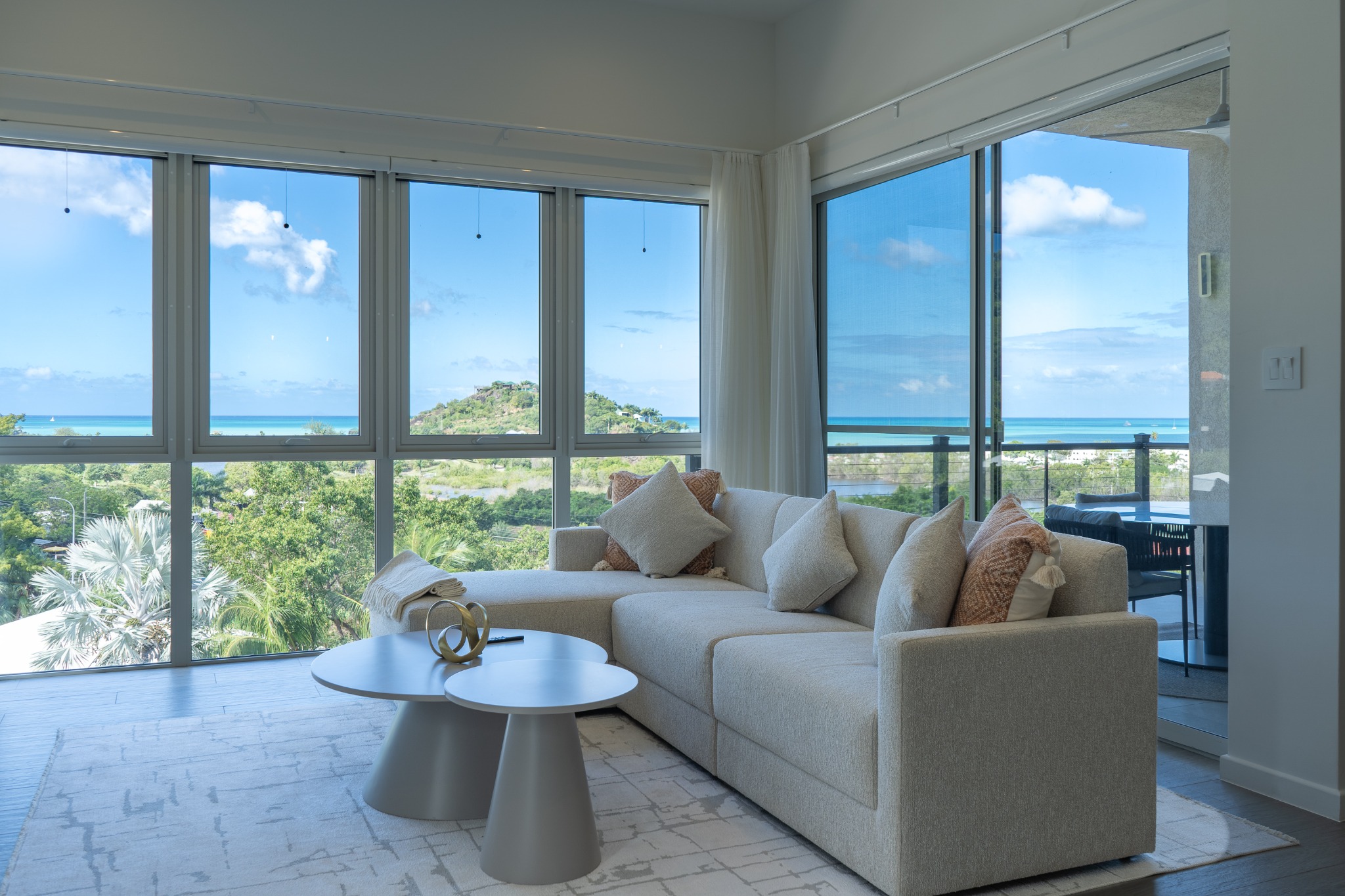 Luxury living room with panoramic Caribbean sea view — Sugar Ridge Condos